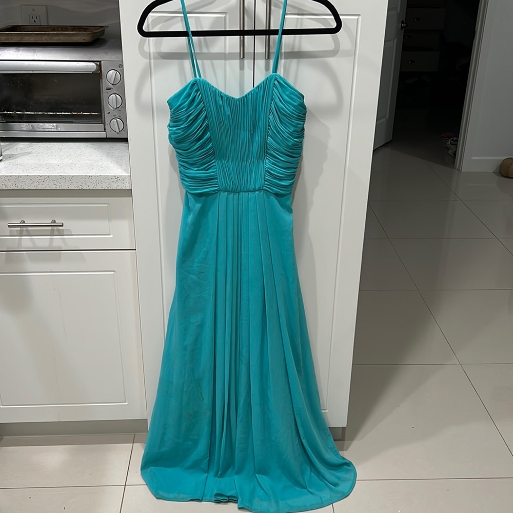 Woman’s long, W too size 8, 100% polyester, straps can be removed